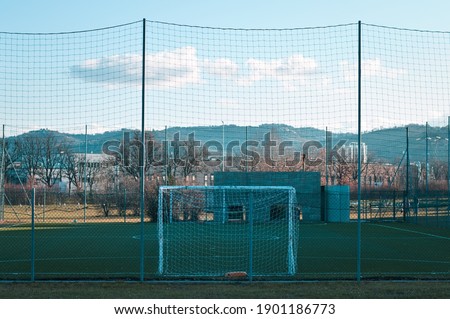 A football goal in a shady futsal field (Pesaro, Italy, Europe)