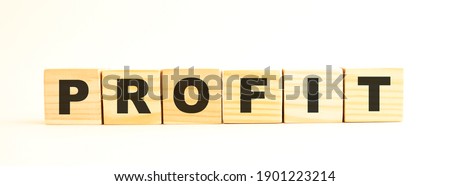The word PROFIT. Wooden cubes with letters isolated on white background. Conceptual image.