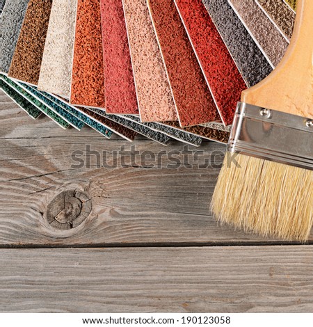 The color palette on the wooden background