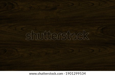 Abstract crown cut dark brown walnut wood veneer