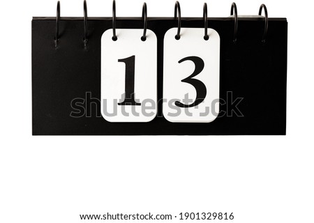 Close up view of calendar with selected date 13 isolated on white background. 