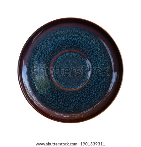 top view of ceramic saucer isolated on white.