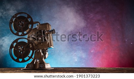 Old style movie projector, still-life, Royalty-Free Stock Photo #1901373223