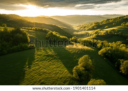 Sunset over the hills in Umbria Royalty-Free Stock Photo #1901401114