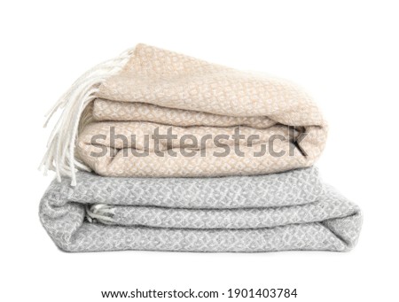 Different stylish soft plaids on white background Royalty-Free Stock Photo #1901403784