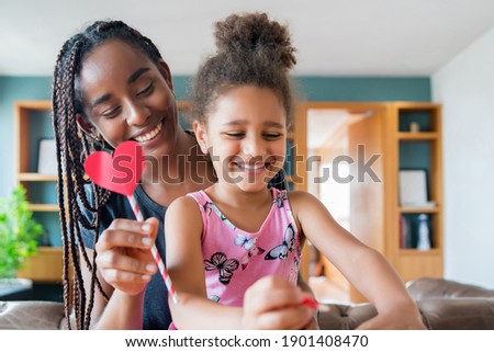Mother and daughter spending time together at home.