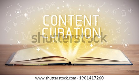 Open book with CONTENT CURATION inscription, social media concept