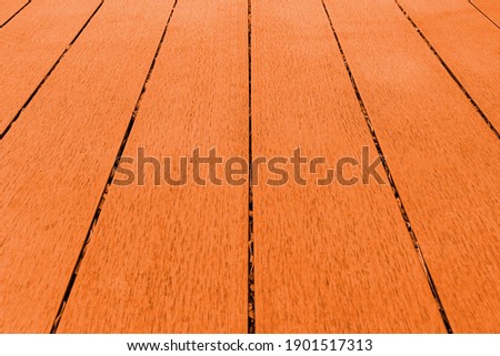 Brown wooden floor on the balcony outside the house pattern and background seamless