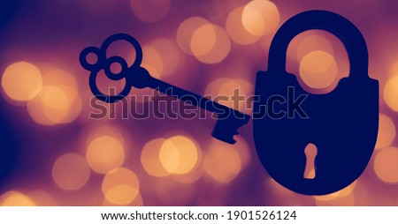 silhouette of Vintage key and padlock isolated on blur bokeh background. 