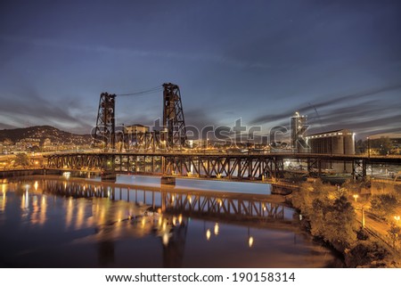 Steel Bridge with Broadway and Fremont Bridges Over Willamette River at Evening Blue Hour in Portland Oregon