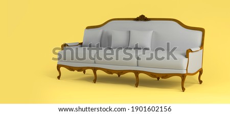 Classic gray fabric sofa with carved decorative elements and soft pillows on yellow background. Furniture, interior object, Fabric elegant sofa. Color of year 2021. Illuminating and Ultimate gray