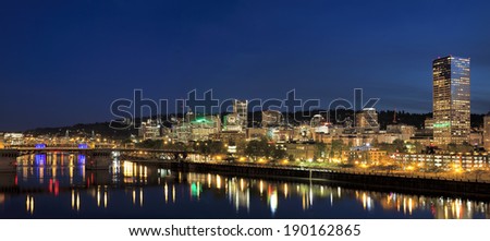 Portland Oregon Downtown City Skyline Along Willamette River Waterfront at Evening Blue Hour Panorama