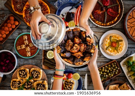 Dried eggplant stuffed with rice, tomato and olive oil known as dolma.  Royalty-Free Stock Photo #1901636956