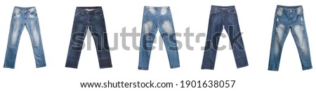 Five pairs of dark blue and light blue jeans isolated on white background. Faded white spots on the waist and legs areas. Banner size. Clothing, online store concept.
