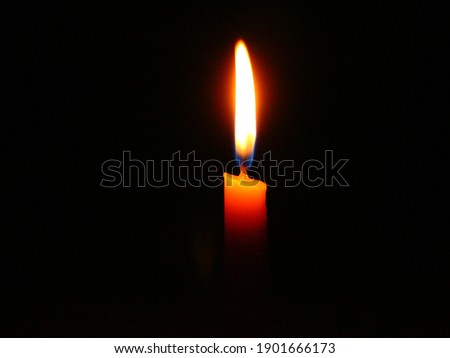 
Candle light in the dark at night