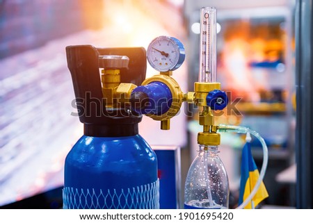 Medical equipment for oxygen supply and distribution. Oxygen reducer Royalty-Free Stock Photo #1901695420
