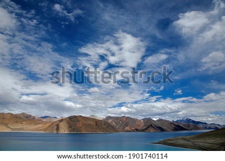 Clouds over Pangong Lake. Pangong Tso or Pangong Lake is an endorheic lake spanning eastern Ladakh and West Tibet situated at an elevation of 4,225 m. 