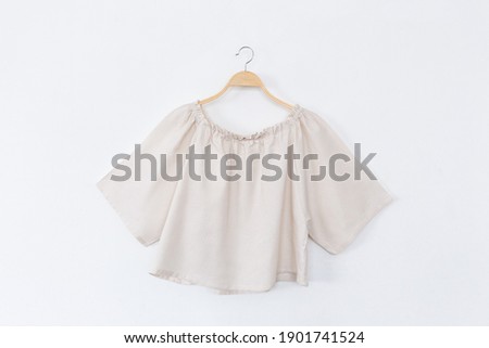 Woman blouse with summer blouse cotton on white background. Royalty-Free Stock Photo #1901741524