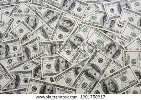 One hundred dollar bills background Royalty-Free Stock Photo #1901750917