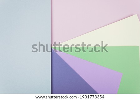 Abstract pastel colored paper texture. Geometric shapes and lines. Minimalist background. Flat lay. Copy space.