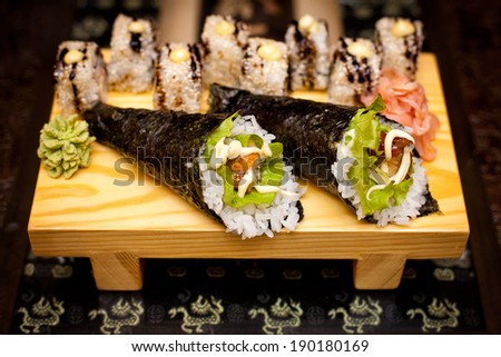 Closeup picture diverse roll sushi, wasabi, sushi roll, fresh Japanese restaurant seafood, tasty asian sea food plate. Traditional oriental gourmet, cuisine kitchen, diet, dish, culture