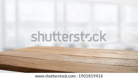 blurred window background with table Royalty-Free Stock Photo #1901819416