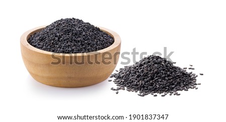 sesame in wood bowl isolated on white background Royalty-Free Stock Photo #1901837347
