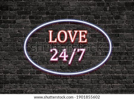 neon red LOVE and neon pink 24-7 surrounded with neon blue elliptical on dark brick wall