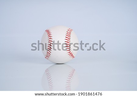 View of softball with white background. 