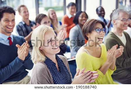 Group of Multiethnic Cheerful People Applauding Royalty-Free Stock Photo #190188740