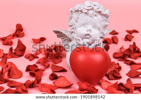 Cupid with red heart on Pink Background, Celebrating Valentine's Day