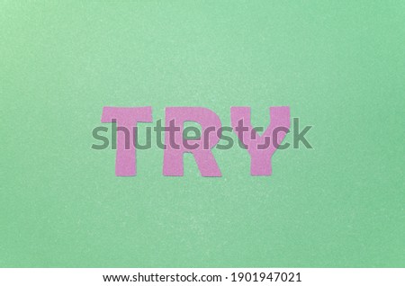 'TRY' word made  of letters. Words on a green background.