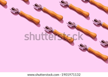 Opener pattern on pink background hard shadows copy space