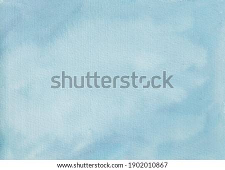 Soft blue watercolor abstract background. Hand painted watercolor background in blue color.
