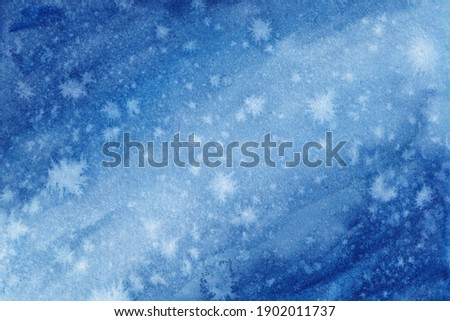 Blue watercolor winter background. Hand painted watercolor abstract background