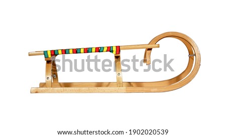 Modern colorful wooden sledge isolated on white background