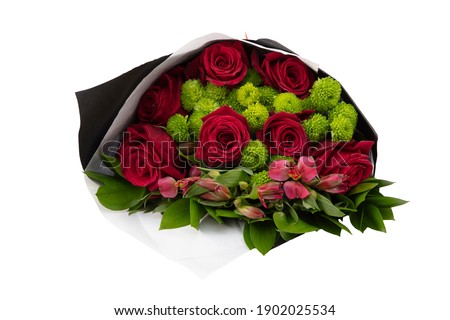 Bright bouquet shot from above, isolated on white. wedding bouquet. Fresh, lush bouquet of colorful flowers .