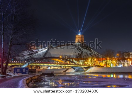 Vilnius, Lithuania - January 25, 2021: Vilnius main symbol, Gediminas castle illuminated for 698 city birthday celebrations Royalty-Free Stock Photo #1902034330