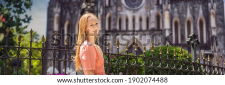 Young woman tourist on background of St Joseph's Cathedral in Hanoi. Vietnam reopens after coronavirus quarantine COVID 19 BANNER, LONG FORMAT