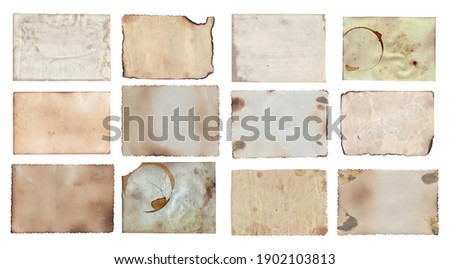 Old vintage photo paper texture with stains and scratches background Royalty-Free Stock Photo #1902103813