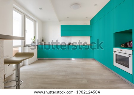 Kitchen interior in light blue colors. Scandinavian style, color 2020 classic blue pantone