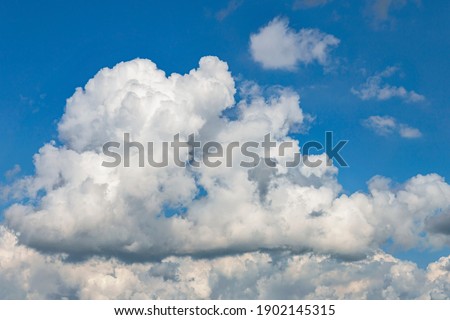 Beautiful blue sky with white clouds as a natural background

