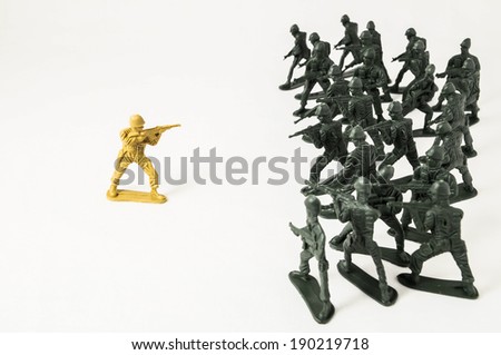 Plastic Lead Soldiers Representing War on a White Background Royalty-Free Stock Photo #190219718