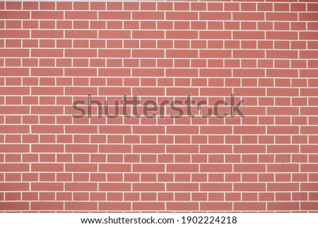 Red grunge brick wall, abstract background texture with vintage style pattern