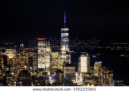 Scenic view of Manhattan downtown skyscrapers at night from above