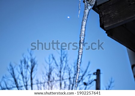 An icicle on a roof