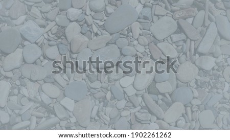 Gray pebbles or smooth rocks or stones