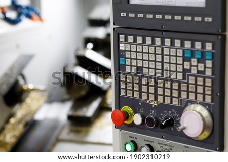 Control panel of metalworking CNC machine. Selective focus.