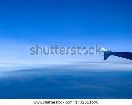 Photographs of clouds seen from above, above clouds, in an airplane