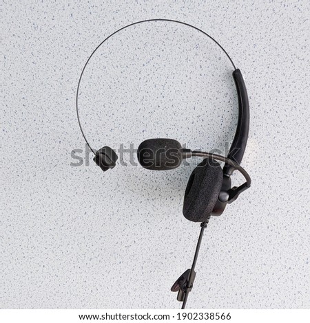 Headphones with a microphone isolated on white background.
